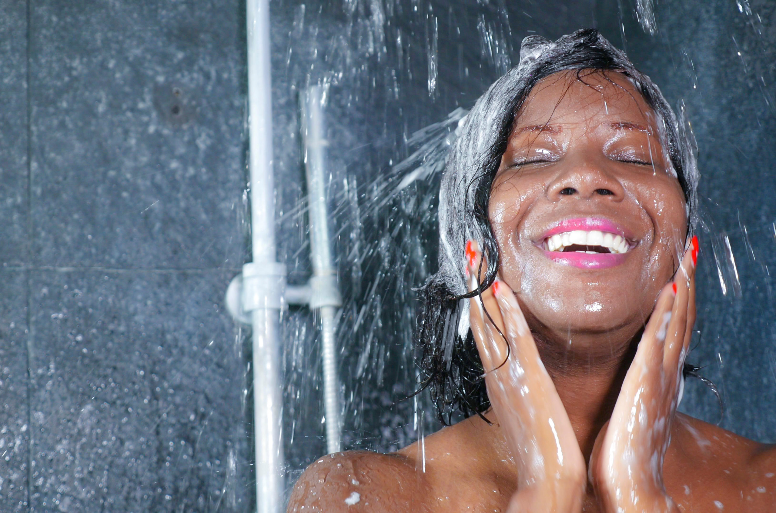 woman washing hair water